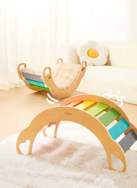 A mideer wooden rainbow climber in a nursery