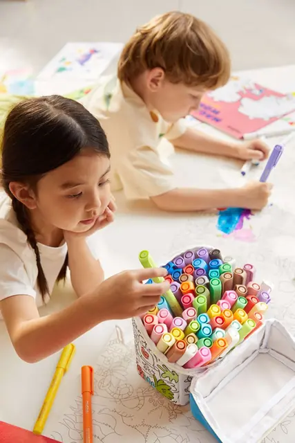 A child modelling with mideer clay